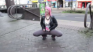 Beautiful and very slutty battle-axe shows her ass in public while pissing between her legs